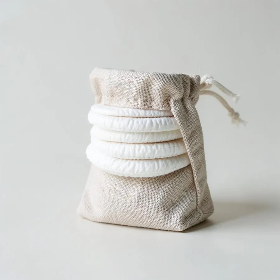 Reusable cotton facial rounds in a linen pouch