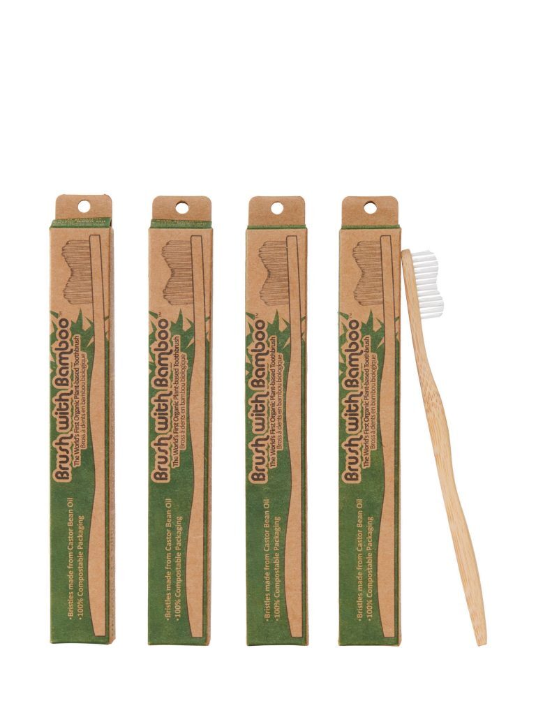 Bamboo toothbrush standing upright