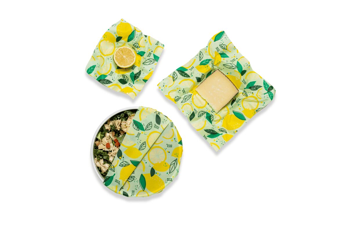 Folded beeswax food wraps in earthy patterns
