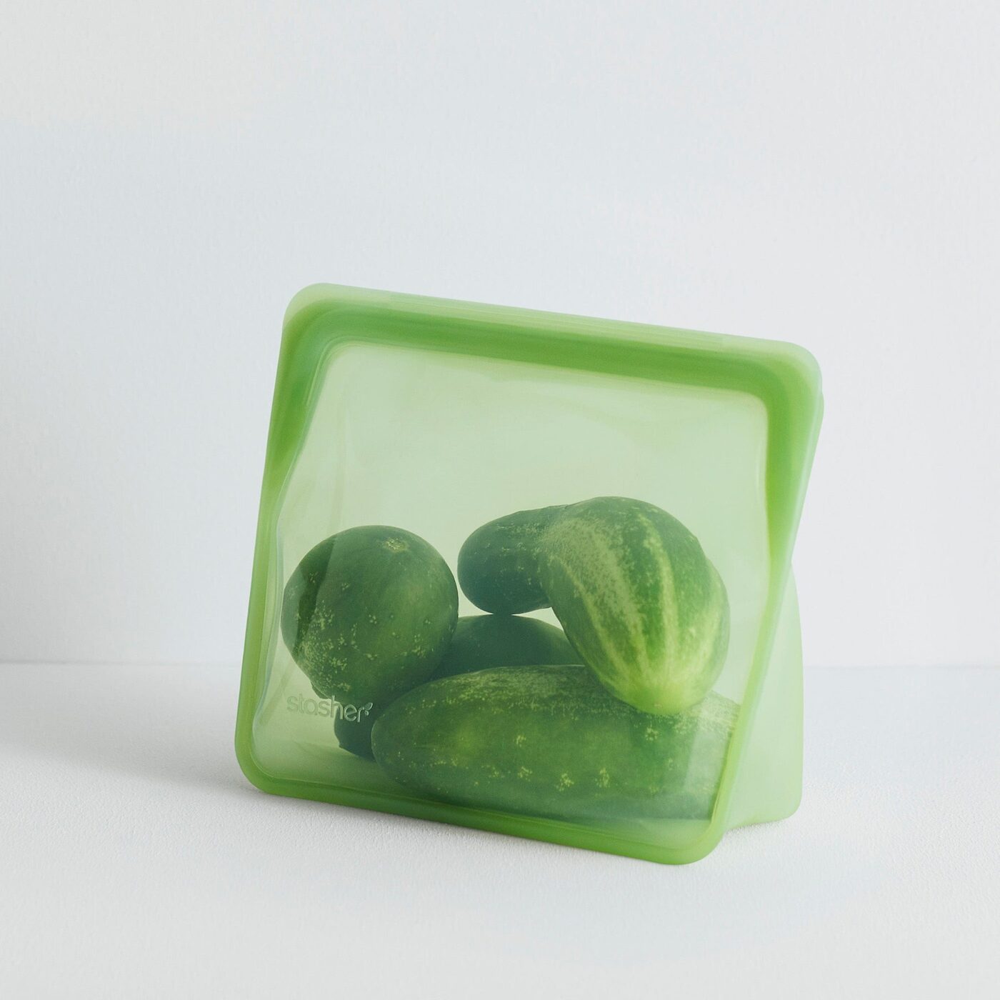 Reusable silicone food storage bag in soft sage green