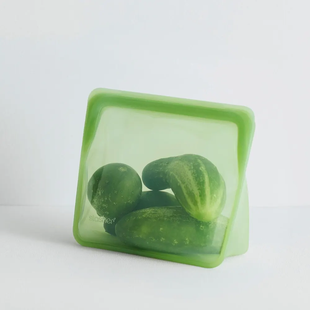 Reusable silicone food storage bag in soft sage green